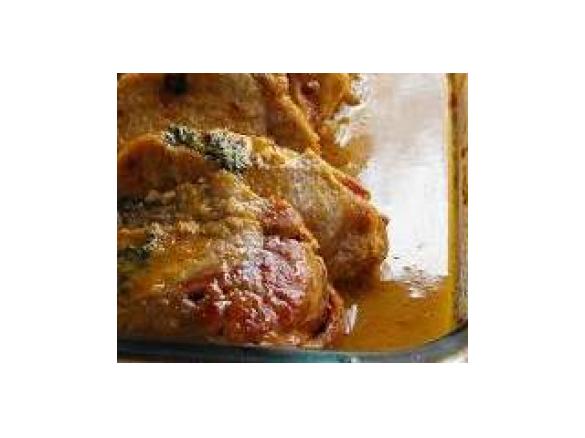 Porco com molho de laranja e natas