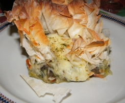 Cogumelos salteados com espinafres em cama de massa filó