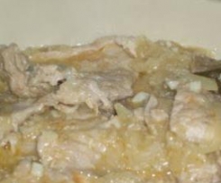 Bifes em molho de cebola