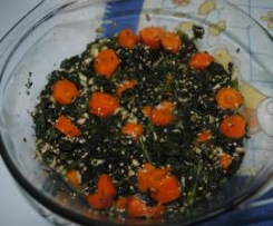 Espinafres a vapor com cenoura e sementes.