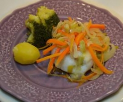 Medalhões de pescada no papelote