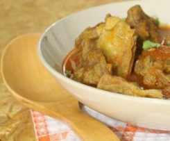 Borrego com coentros