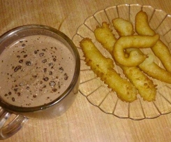 Churros com chocolate quente