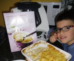 Frango com alho, limão e milho gratinado