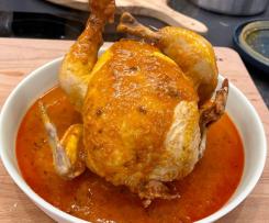 Frango sentado com laranja e arroz a vapor