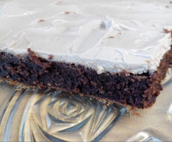 Brownies de chocolate negro com cobertura de queijo creme